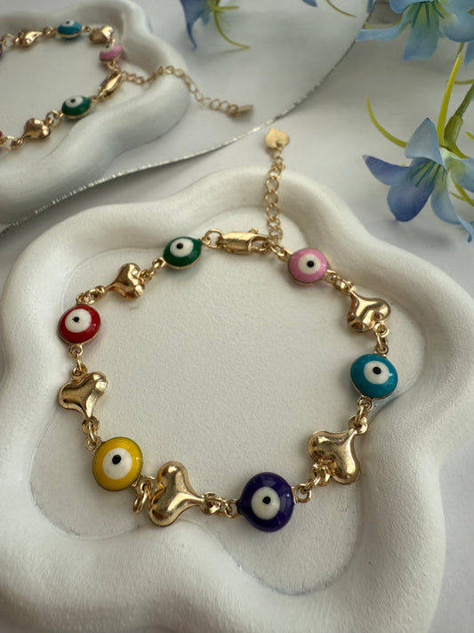 Pulsera Multicolor con ojitos y corazones – Vibras alegres
